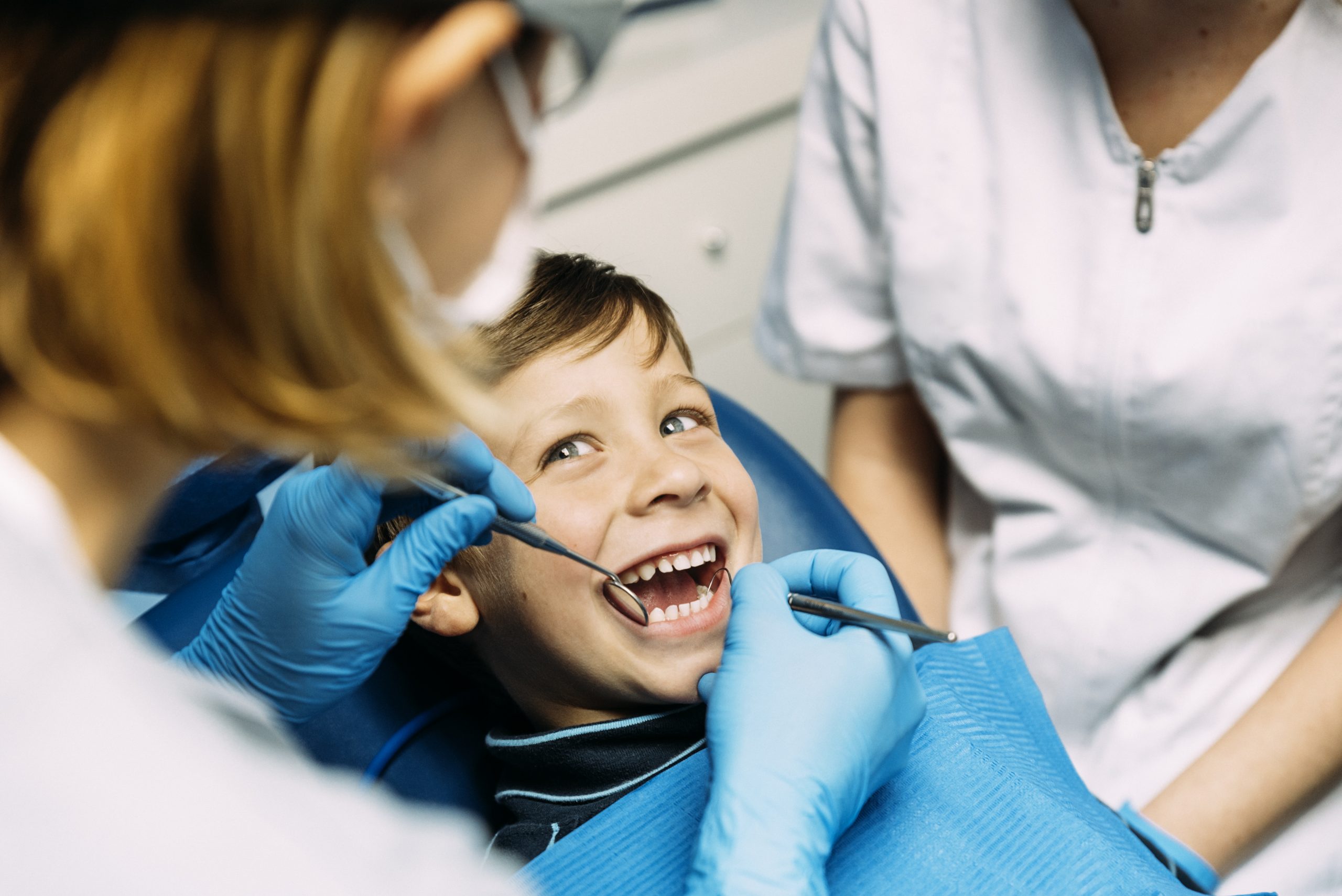 Smiling young boy at a dental checkup