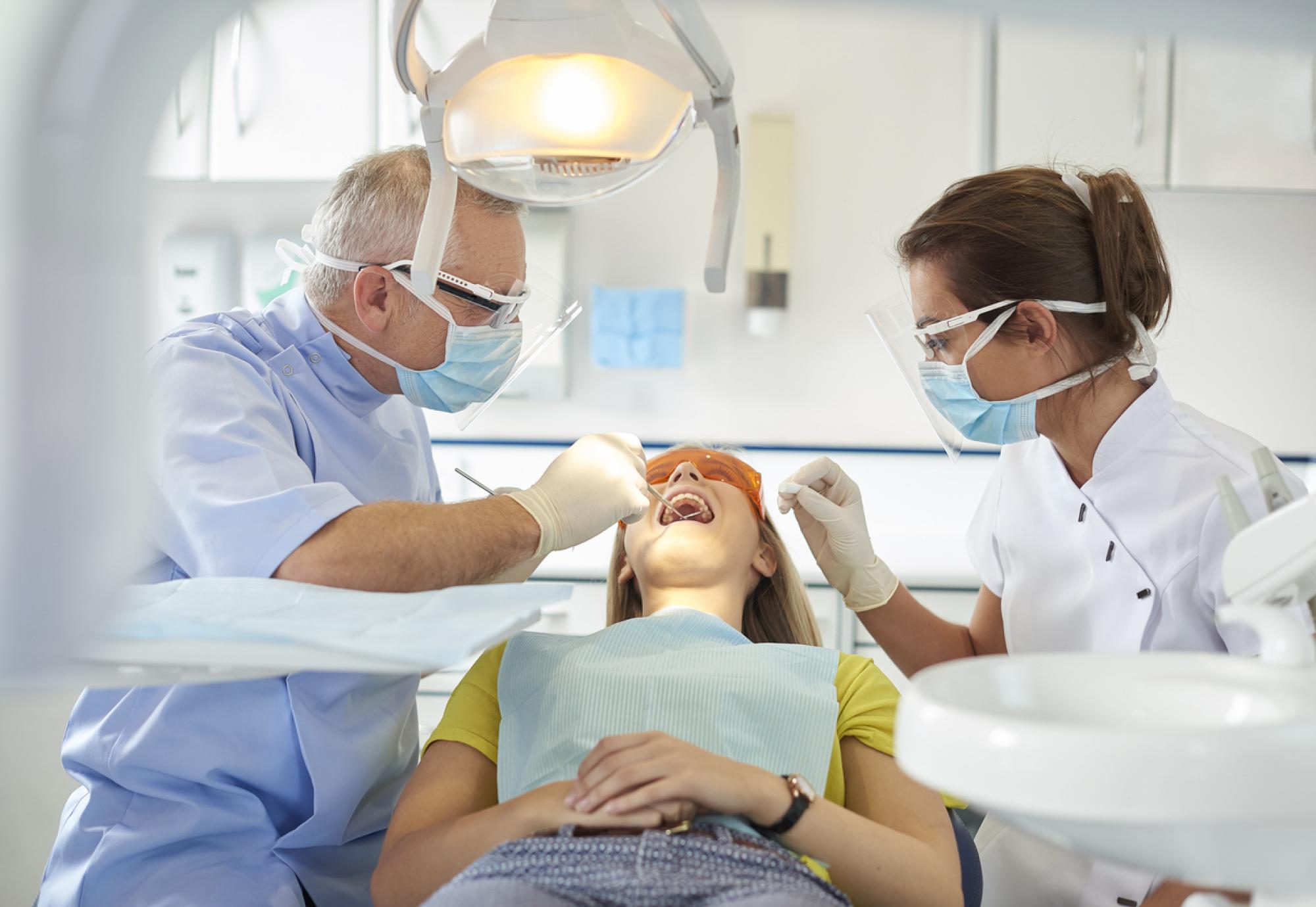 Female Patient In Dentistry Chair